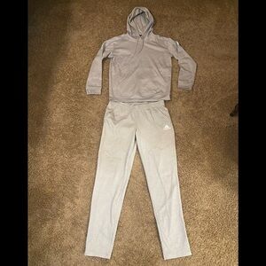 Adidas Woman’s 2-Piece Hoodie Sweatsuit Set.